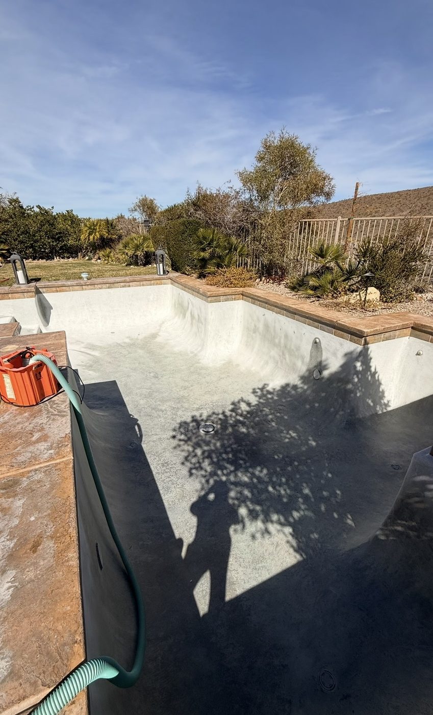 Drained pool with mineral staining before acid wash, Las Vegas Henderson