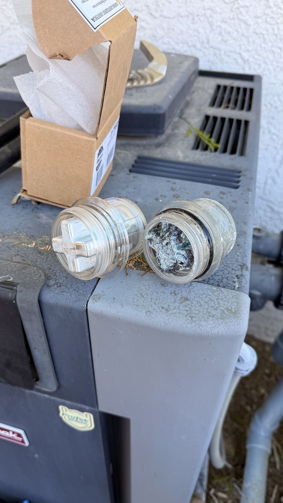 Pool heater fitting clogged with calcium scale
