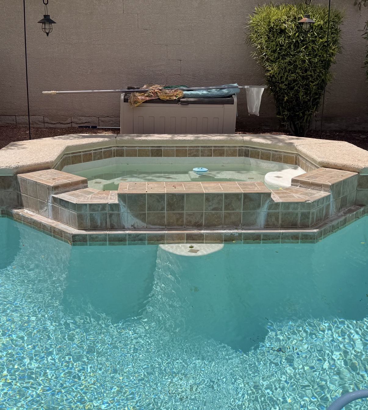 Spa and pool tile line with calcium buildup